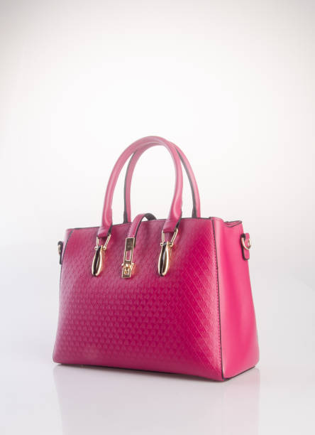 Bag or red colour woman bag on background