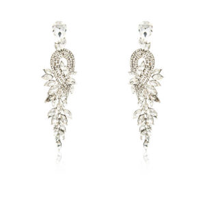 Pair of silver diamond earrings isolated on white background
