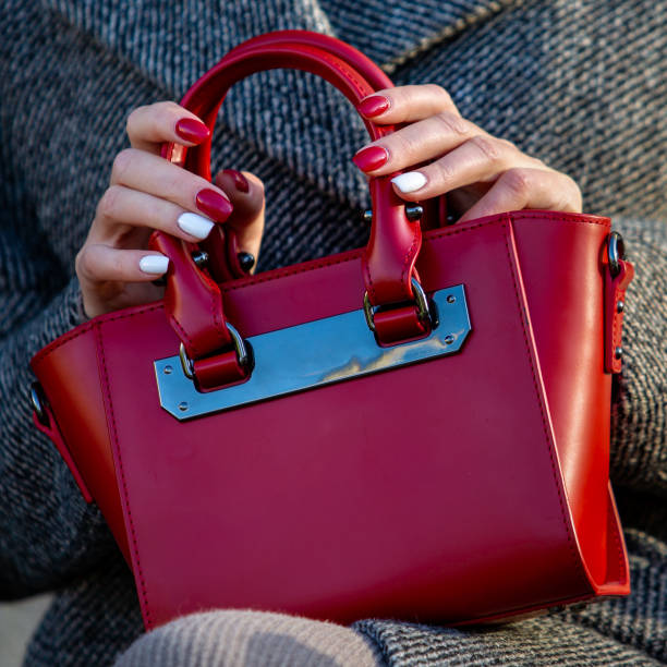 Red ladies handbag closeup. fashion accessory